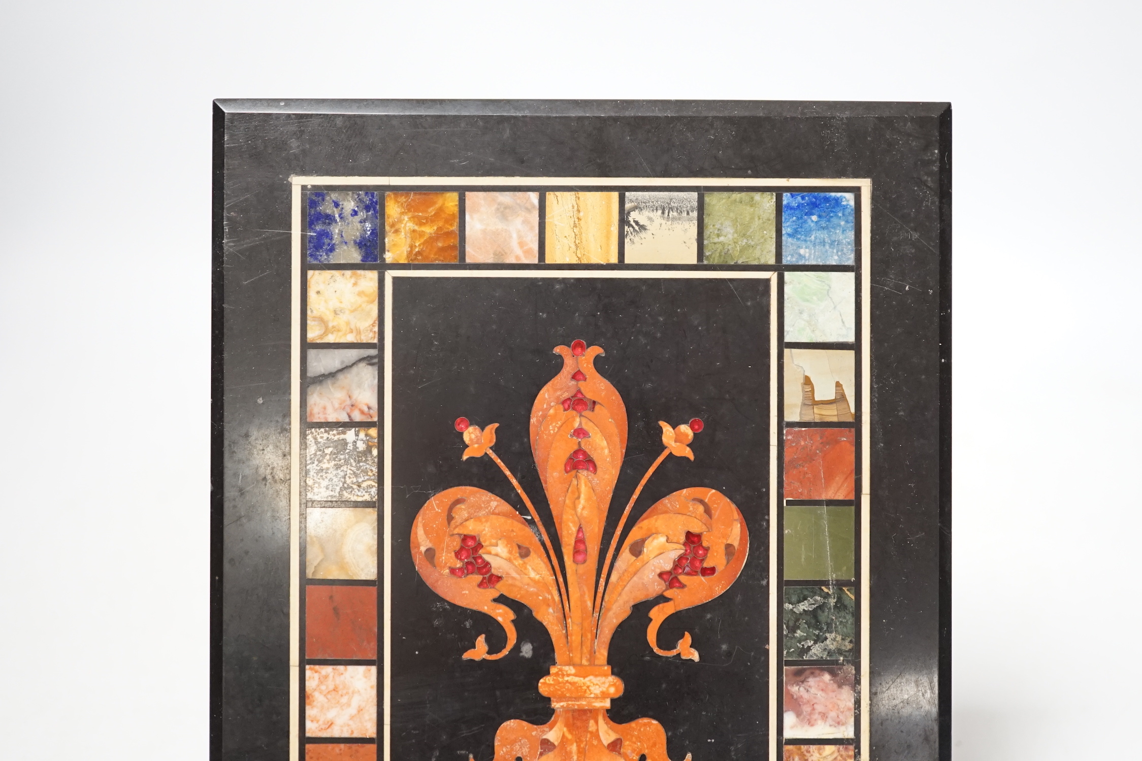 An Italian pietra dura ‘fleur de lys’ plaque, 20x15.5cm